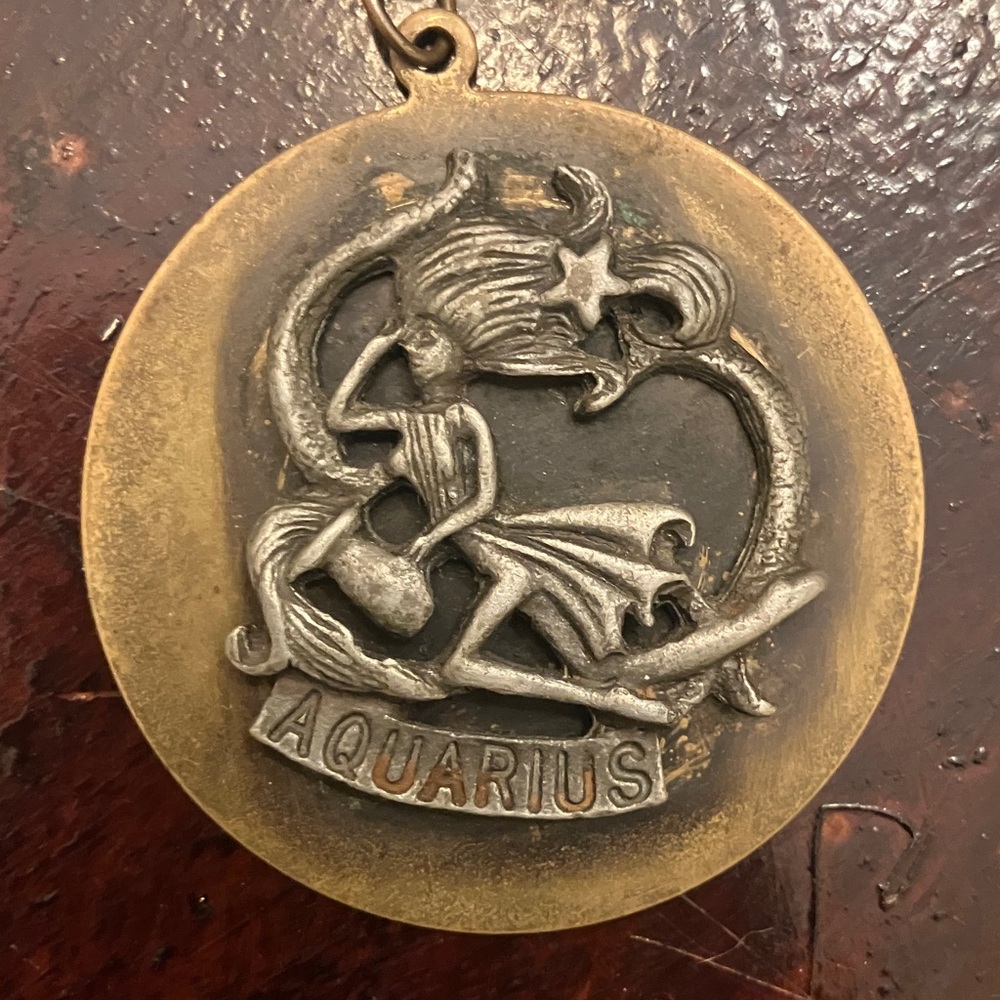 Aquarius Zodiac Pendant Necklace in Antique Gold